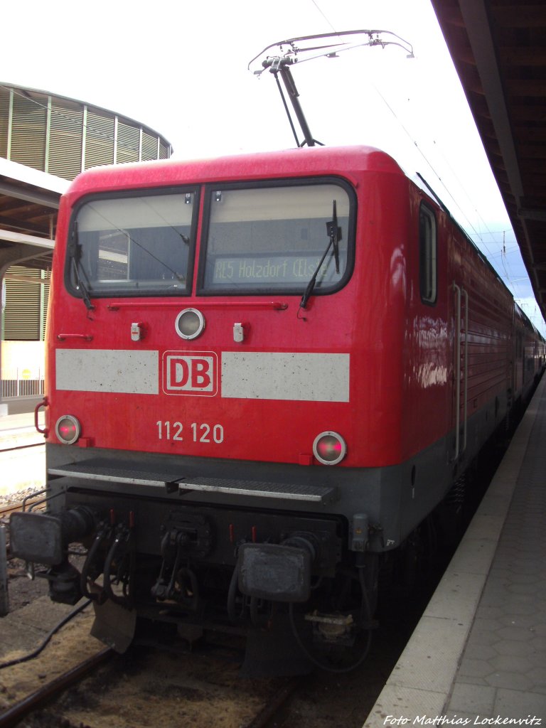 112 120 als RE5 mit ziel Holzdorf {Elster} im Bahnhof Stralsund Hbf am 13.8.13