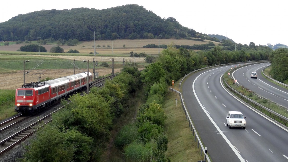 111-207 und 3 n-Wagen sind als RB 58194 am 20.August 2013 nach Hafurt unterwegs, nchster Halt Ebelsbach-Eltmann.