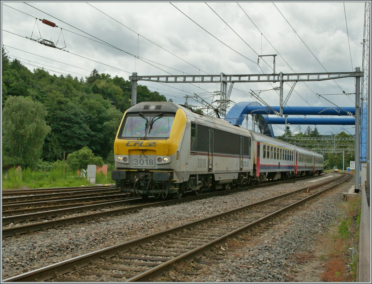 CFL 3018 mit einen IR nach Liers in Ettelbruck. 
15. Juni 2013