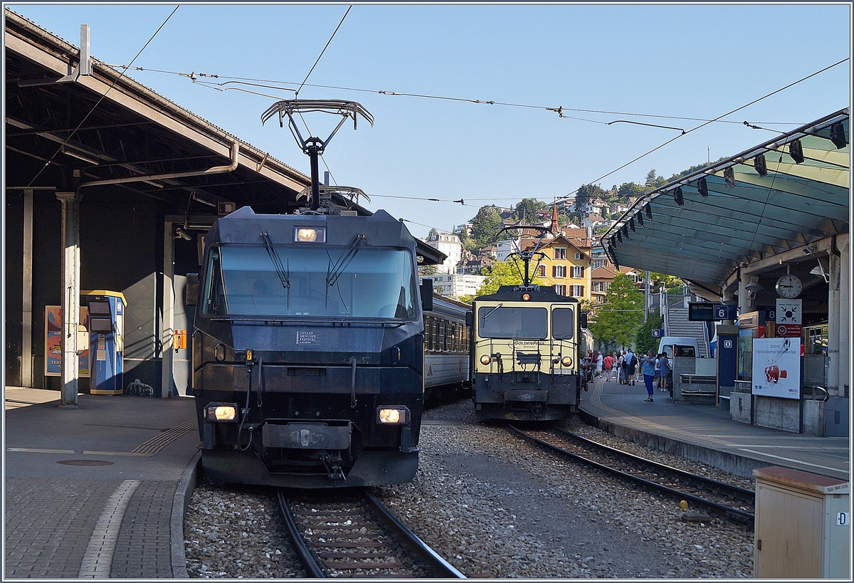 Die MOB Ge 4/4 8003 und die GDe 4/4 warten in Montreux auf die Abfahrt.
21. Juni 2018
