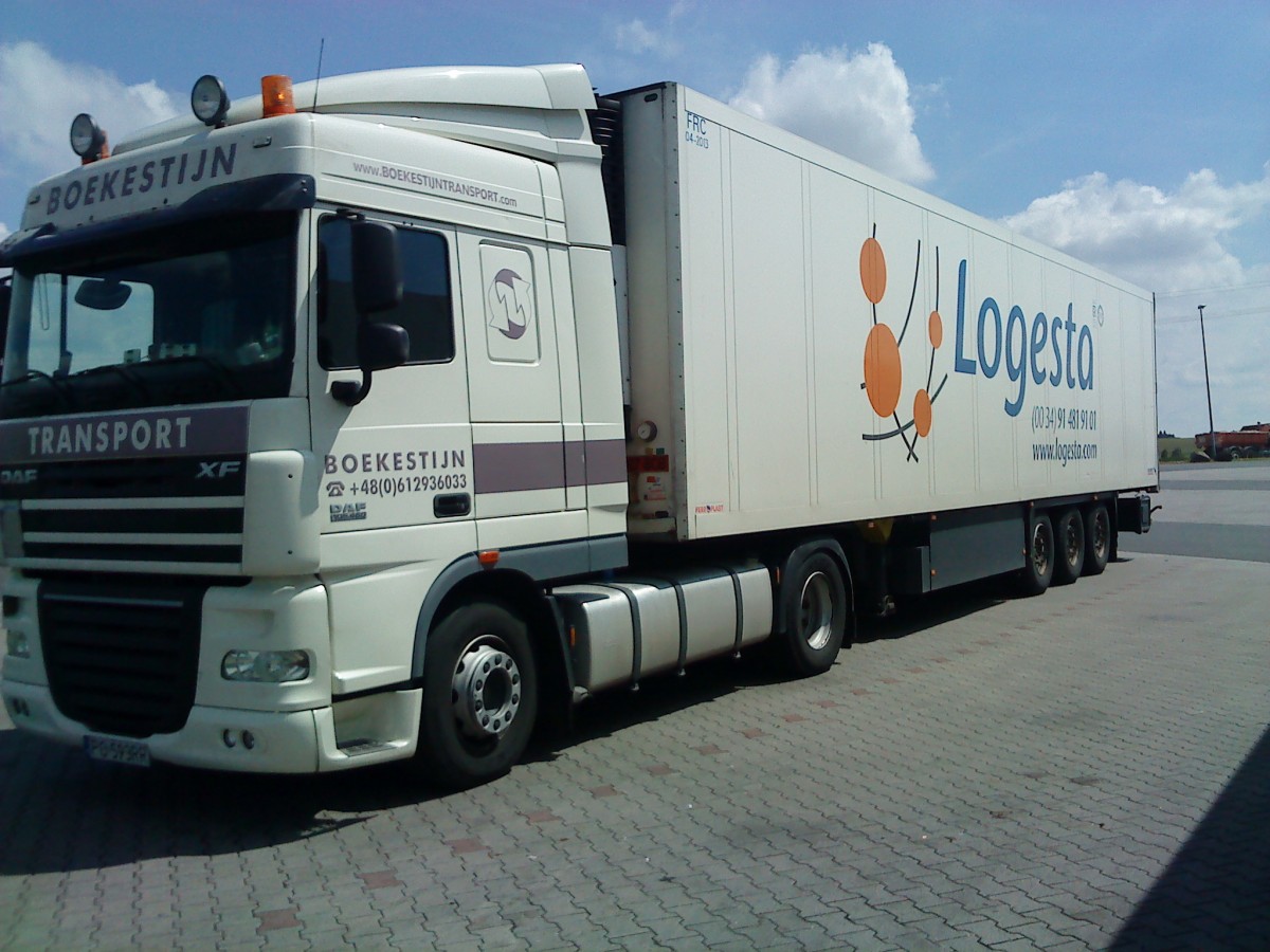 SZM DAF XF mit Khlkoffer-Auflieger der Spedition Logesta gesehen auf dem Autohof in Grnstadt am 16.05.2014