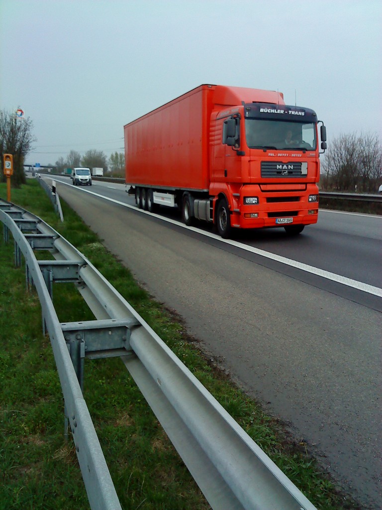 SZM MAN TGX 18.440 mit Kofferauflieger der Spedition Bchele-Trans gesehen auf der A 61 Hhe Rasthof Dannstadt am 18.03.2014