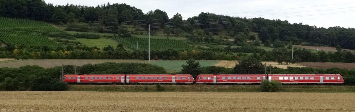Zwei Triebzge der Baureihe 612 eilen am 20.August 2013 nach Wrzburg Hbf.