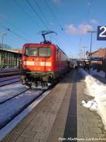 am 26.3.13 ist 112 106 Als RE9 mit Ziel Ostseebad Binz im Bahnhof Bergen auf Rgen.