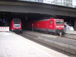 112 176 als RB mit ziel Bad Oldesloe & BR 605 mit ziel Fehmarn im Bahnhof Hamburg Hbf am 1.9.13