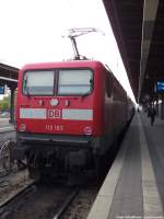 BR 112/290885/112-183-standte-als-re5-mti 112 183 standte als RE5 mti ziel Holzdorf (Elster) im Bahnhof Stralsund Hbf bereit am 31.8.13