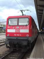 BR 112/369339/112-152-4-als-re1-mit-ziel 112 152-4 als RE1 mit ziel Hamburg Hbf im Bahnhof Rostock Hbf am 13.7.14
