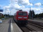 112 104 als RE5 mit ziel Rostock Hbf beim einfahren in den Bahnhof Gstrow am 15.7.14