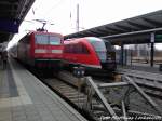 143 589-0 Als S3 mit Ziel Gstrow + 642 048/548 als RB12 mit Ziel Graal-Mritz im Bahnhof Rostock Hbf am 3.2.13