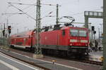 BR 143/776350/143-957-verlsst-als-s9-den 143 957 verlsst als S9 den Bahnhof Halle/Saale Hbf in Richtung Eilenburg am 20.1.22