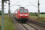 BR 146/742368/146-008-mit-dem-re30-mit 146 008 mit dem RE30 mit Ziel Magdeburg Hbf bei der Einfahrt in den Bahnhof Zberitz am 13.6.21