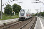 intercity-ic/742139/146-563-mit-einem-ic2-bei 146 563 mit einem IC2 bei der Durchfahrt in Zberitz am 9.6.21