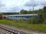 Grafittisierter Personenwagen in Neustrelitz am 16.6.14