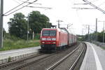 meg/741952/145-022-der-meg-mit-einem 145 022 der MEG mit einem Autotransportzug bei der Durchfahrt in Zberitz am 9.6.21