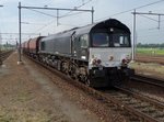rheincargo/509947/de-683-zieht-ein-aus-rumnische DE 683 zieht ein aus Rumnische Wagen gebildeter Kohlezug durch Lage Zwaluwe am 23 JUli 2016.