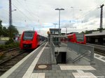 622 030 / 530 und 425 121 / 621 im Bahnhof Frankenthal Hbf am 2.6.16
