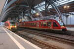 BR 648/776309/648-349849-und-648-335835-im 648 349/849 und 648 335/835 im Bahnhof Lbeck Hbf am 4.1.22
