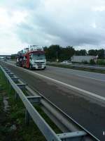 Autotransporter/358650/renault-premium-autotransporter-gesehen-auf-der Renault Premium Autotransporter gesehen auf der A 61 Nhe Raststtte Dannstadt am 14.07.2014