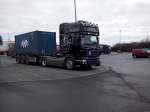 SZM SCANIA R 500 der Spedition M. Mnch Int. Transporte mit Containerauflieger gesehen auf dem Autohof in Grnstadt am 12.02.2014