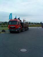 holztransporter/350508/szm-man-tgx-mit-langholztransporter-gesehen SZM MAN TGX mit Langholztransporter gesehen auf dem Autohof in Grnstadt am 16.06.2014