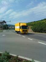 MAN Motorwagen mit Kastenaufbau der Firma Weishaupt unterwegs in Bad Drkheim am 06.08.2013