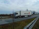 SZM SCANIA R 420 mit pritsche-Planen-Auflieger der Spedition Sievert Schuck unterwegs von Aldi Zentrallager zum Autohof in Grnstadt am 18.02.2014