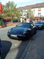 PKW Porsche GT Sportwagencabriolet in der Innenstadt von Bad Drkheim am 01.10.2013