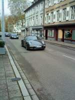 PKW Porsche Carrera Sportwagen unterwegs in Baden-Baden am 02.11.2013