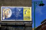 Reklametafel Brick Lane, London:  Don't get caught naked!  Auf Deutsch:  Laß dich nicht nackt auf der Brick Lane schnappen!  