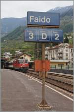 SBB Re 4/4 II 11228 in Faido, an der Gotthard Südrampe.
6. Mai 2014