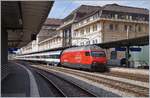 Die SBB Re 460 003-7 mit eine mir nach Luzern beim Halt in Lausanne. 

17. April 2020