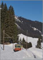Bahnen der Jungfrau Region/327442/der-blm-be-44-22-auf Der BLM Be 4/4 22 auf der Fahrt Richtung Grütschalp kurz nach Winteregg.
9. März 2014