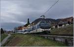 Die MOB Ge 4/4 8001 mit eine Panoramic Express auf der Fahrt von Zweisimmen nach Montreux bei Planchamp. 

12. März 2020