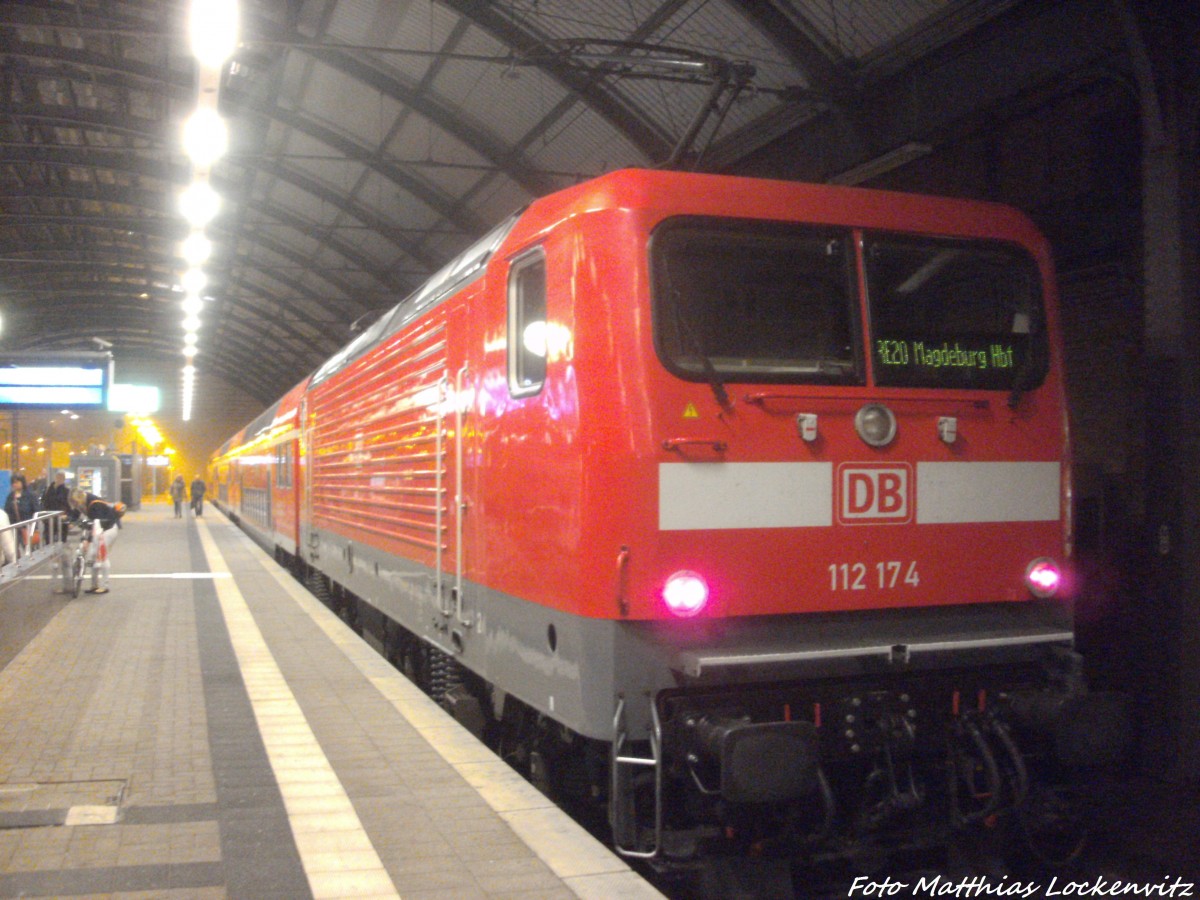 112 174 als RE20 mit ziel Magdeburg Hbfim Bahnhof Halle (Saale) Hbf am 15.9.14