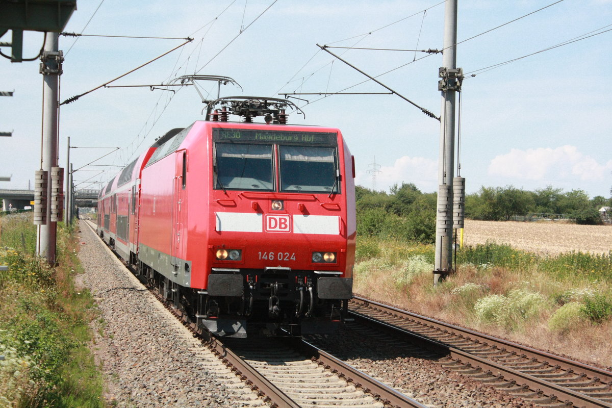 146 024 mit dem RE30 mit ziel Magdeburg Hbf bei der einfahrt in Zberitz am 14.7.20