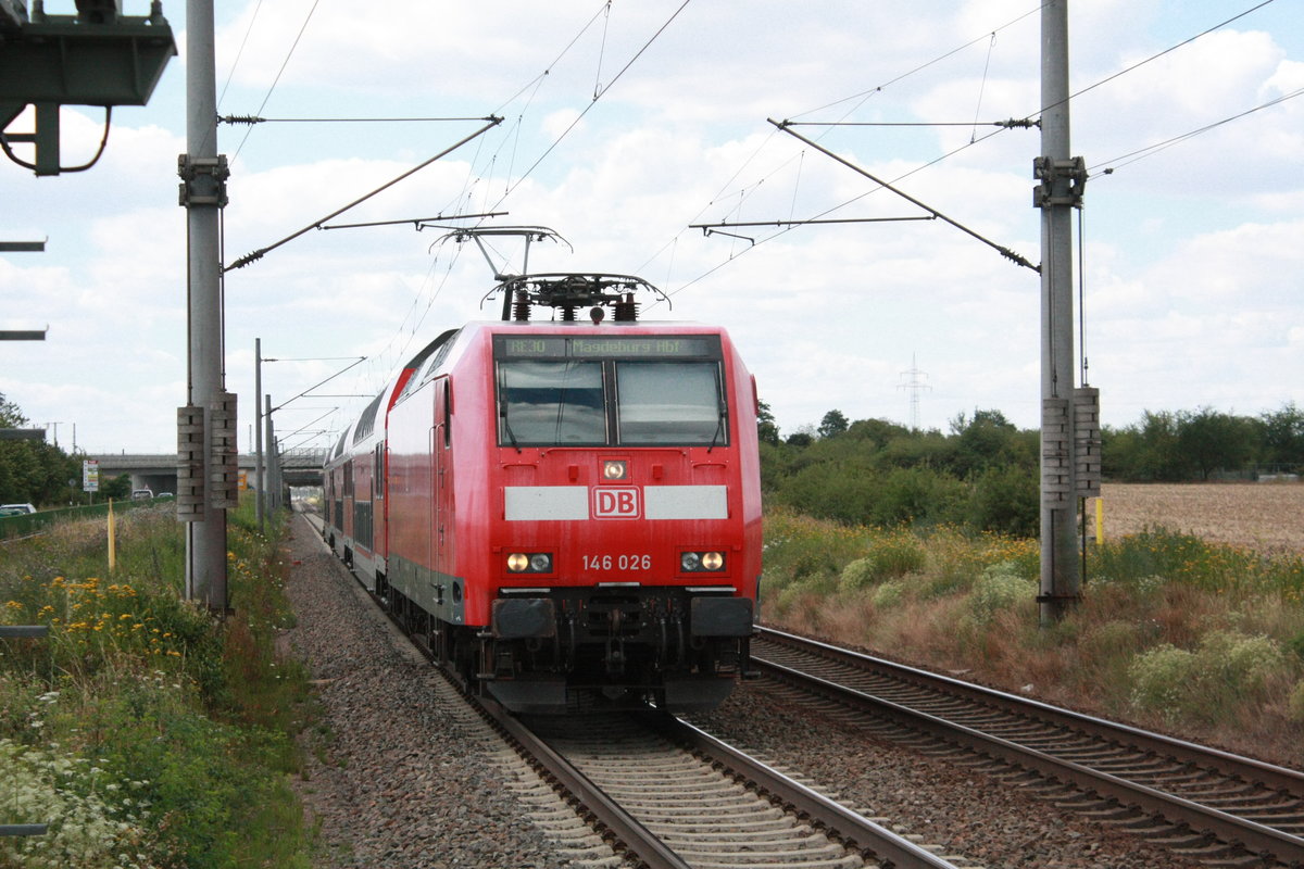 146 026 mit dem RE30 mit ziel Magdeburg Hbf bei der einfahrt in Zberitz am 22.7.20