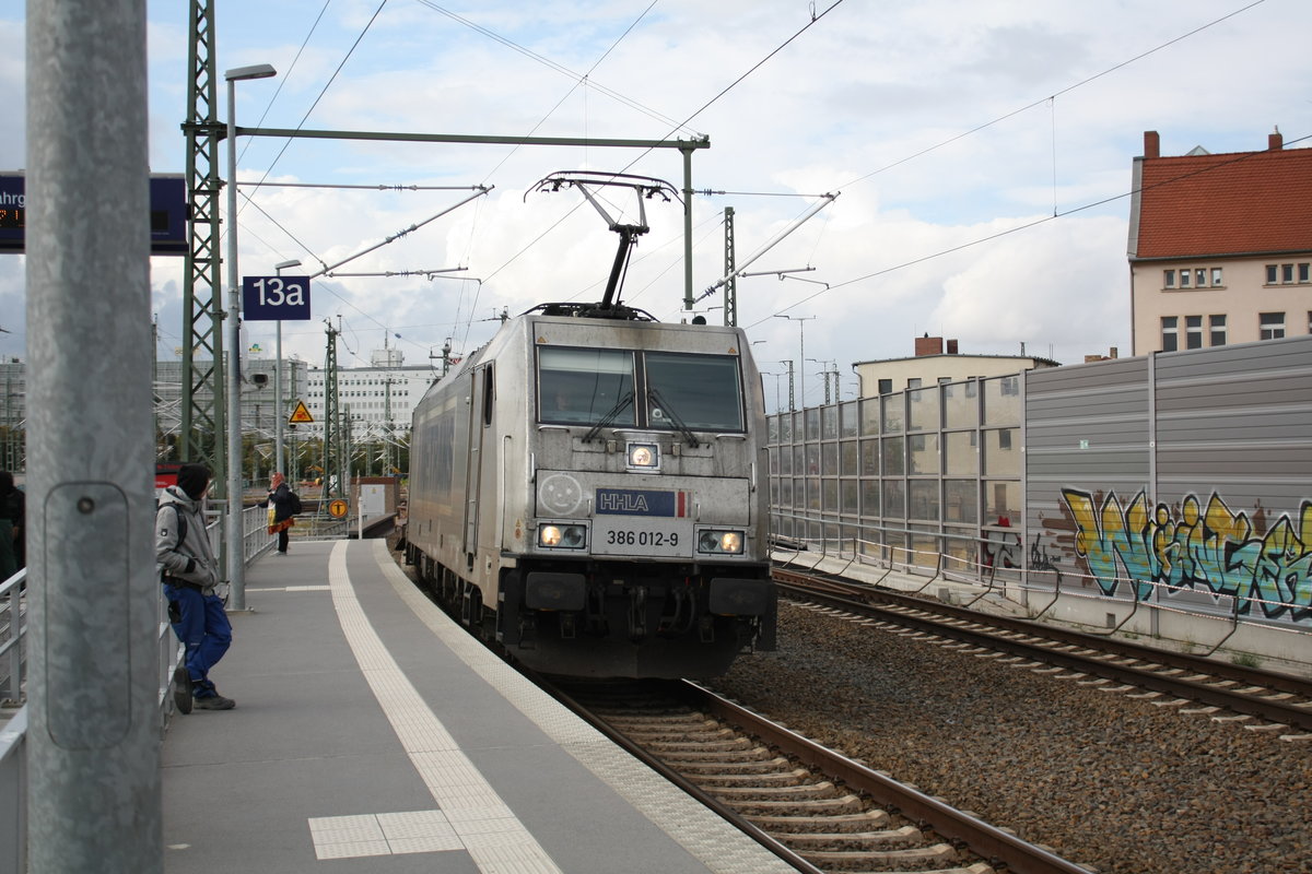 386 012 der HHLA/Metrans in der Gterumfahrung am Hauptbahnhof Halle/Saale am 25.9.19