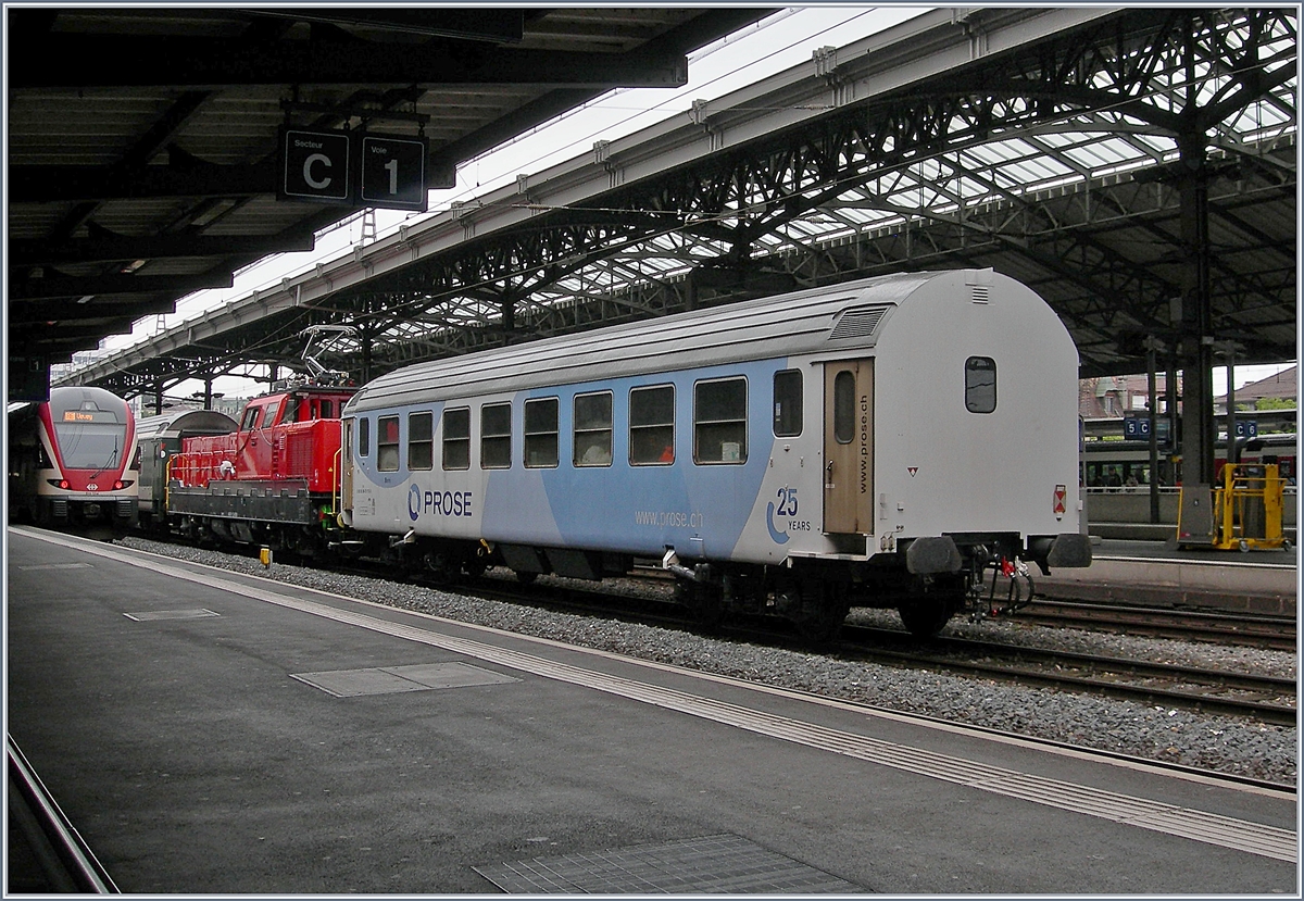 Aem 940 Testfahrten: Da die neue Aem  940 001-1 (UIC 9185 4 940 001-1 CH-SBBI) zwischen den Wagen eingereiht war, konnte sie nur eingeschränkt fotografiert werden.
Lausanne, den 16. Mai 2018