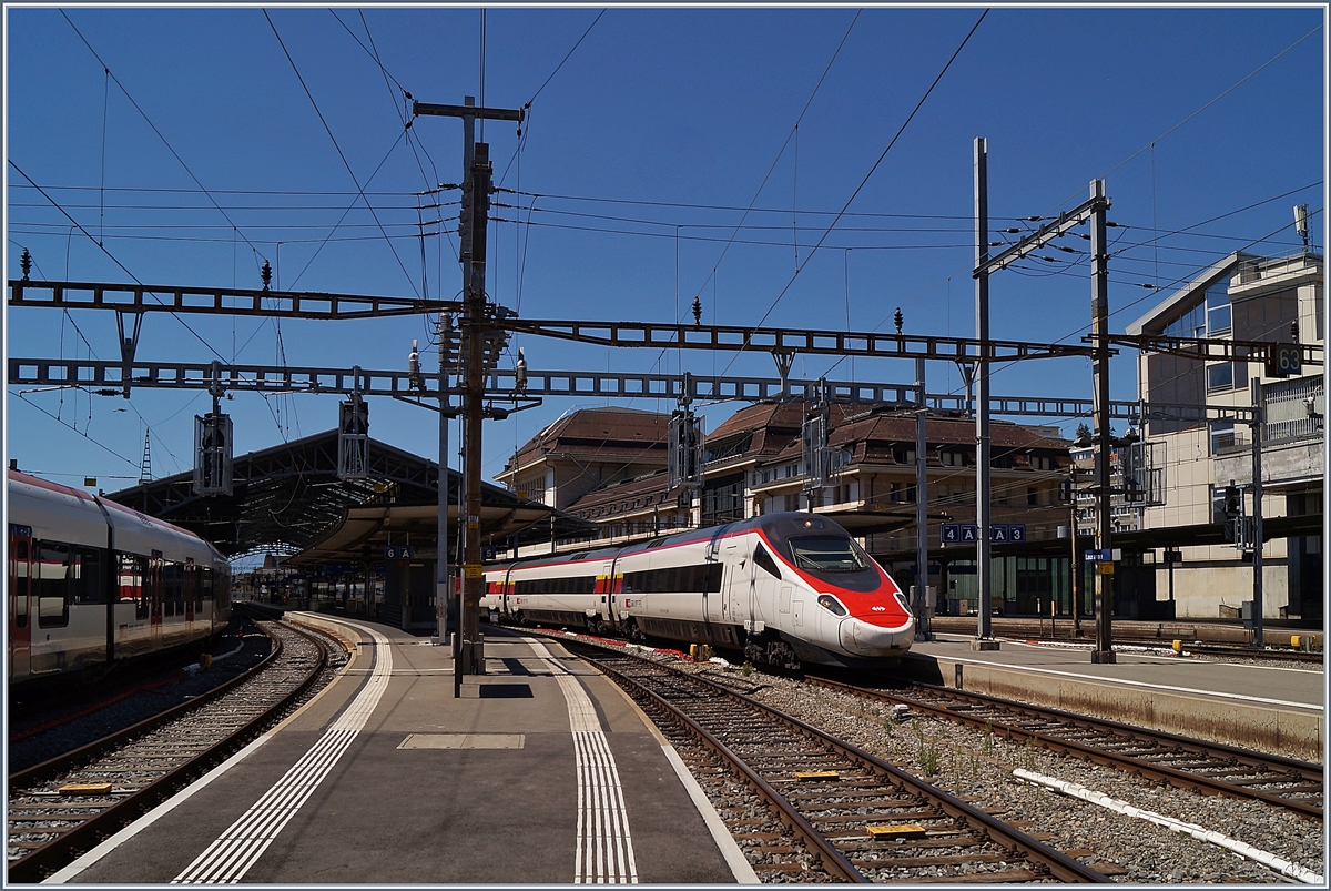 Der SBB ETR 610 006 als EC 39 nach Milano bei der Abfahrt in Lausanne. 

27. Juli 2020