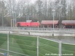 295 XXX mit einen Gterzug im Bahnhof Neuhof (Kr Fulda) am 31.3.16