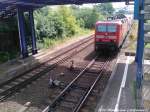 143 889-4 als S1 mit ziel Warnemnde bei der Einfahrt in den S-Bahn Hp. Rostock-Bramow am 22.6.13