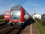 Zwei Regionalbahnen mit Dostos und 143er treffen sich am Haltepunkt Werther bei Nordhausen 19.10.2013