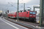 143 957 verlsst als S9 mit Ziel Eilenburg den Bahnhof Halle/Saale Hbf am 15.2.22