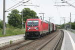 br-187/742142/187-184-mit-einem-gueterzug-bei 187 184 mit einem Güterzug bei der Durchfahrt in Zöberitz am 9.6.21