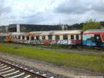 Abgebrannter und Grafittsierter Personenwagen in Neustrelitz am 16.6.14
