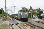 hsl-logistik-gmbh-2/743247/185-601-der-hsl-mit-einem 185 601 der HSL mit einem Autotransportzug bei der Durchfahrt im Bahnhof Niemberg am 5.7.21