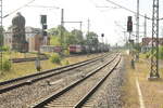145 031 der MEG mit einem Güterzug bei der Durchfahrt im Bahnhof Merseburg Hbf am 14.8.21