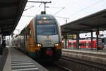 ET 445.110 als RE2 mit ziel Wismar bei der Einfahrt in den Bahnhof Wittenberge am 25.7.21