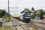RBH/743235/145-010-mit-einem-kesselzug-bei 145 010 mit einem Kesselzug bei der Durchfahrt im Bahnhof Niemberg am 5.7.21