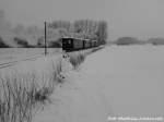 Am 20.3.13 ist RBB Mh 53 unterwegs nach Putbus mit einem Schneemann im Bild oder auch weier Eisenbahner genannt. / hier bei Beuchow
